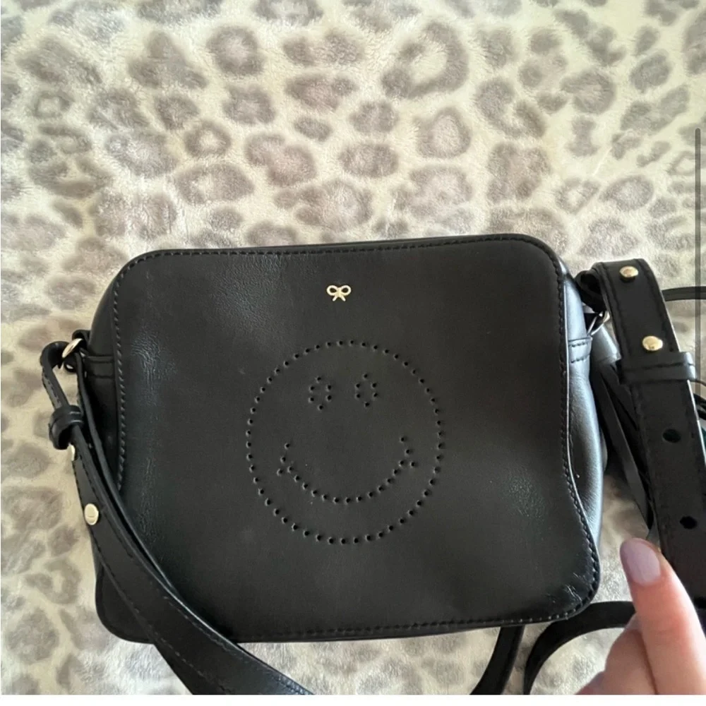 Anya Hindmarch Smiley Eyes Black Leather Crossbody Bag Tassel